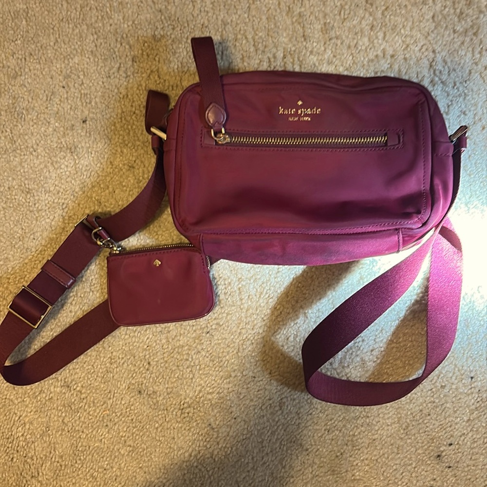 Burgundy Kate Spade cross body bag
Used